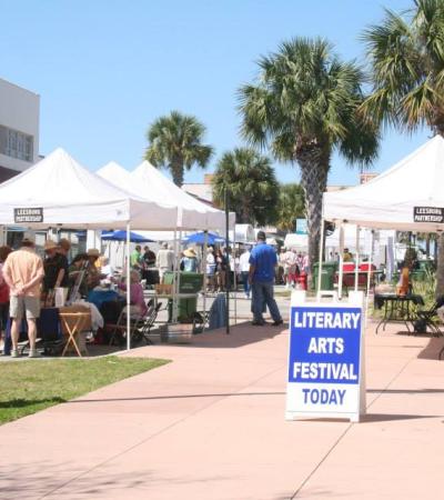 Tents and patrons at the Literary Arts Festival