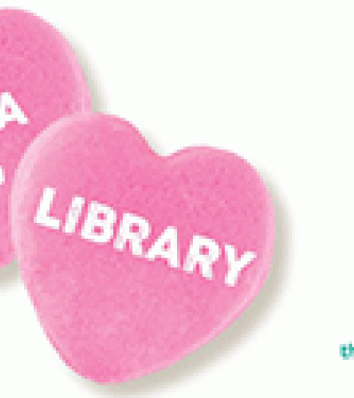 Two pink hearts with "YMCA +" and "Library" written on them