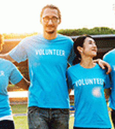 Group wearing shirts that say "Volunteer"