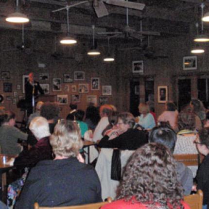 A full house attends “Poetry After Dark” with New Orleans Poet-in-Residence Mark Doty.