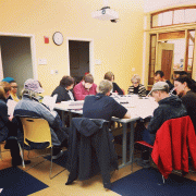 Next Chapter Book Club members gathered around table for discussion Next Chapter Book Club members gathered around table for discussion