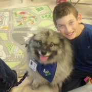 Boy with fluffy dog Boy with fluffy dog