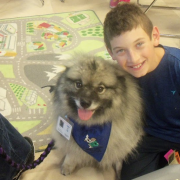 Boy with fluffy dog