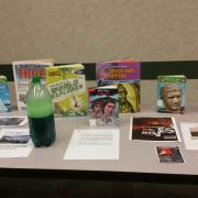 The "tornado in a bottle" and various related items  Books and a tornado in a bottle on display