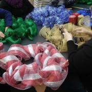 The library spent about $40 on materials for mesh wreaths. The library spent about $40 on materials for mesh wreaths.