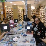 The participants showcase their etched snowflake mirrors. The participants showcase their etched snowflake mirrors.