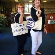 Library staff modeling Shop Small tote bags Library staff modeling Shop Small tote bags