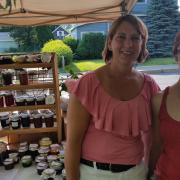A booth at the Farmers Market  A booth at the Farmers Market