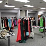 Room full of dresses on racks