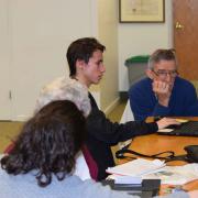 Teens tutoring older adults one-on-one Teens tutoring older adults one-on-one