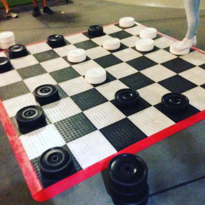 Giant checkerboard with pieces