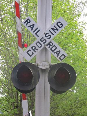 A rail crossing at the Cross Kirkland Corridor, a former railroad right of way extending through the entire city of Kirkland, Washington  (Elsa Steele)