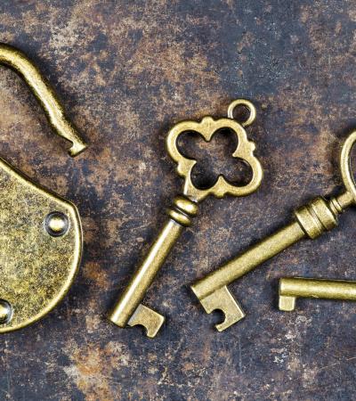 keys and padlock vintage keys and padlock on a rusty metal background