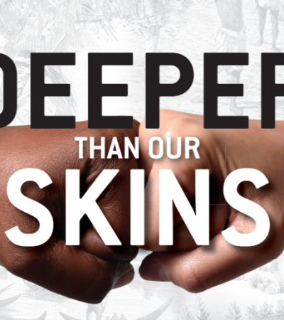 Deeper Than Our Skins - a black fist and a white fist touching one another