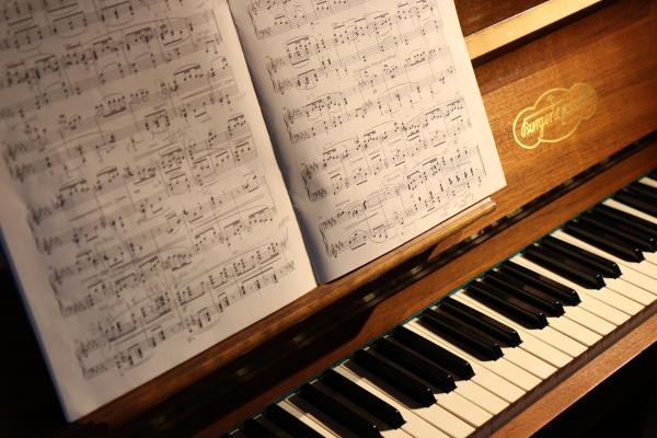 Photograph of a piano with sheet music