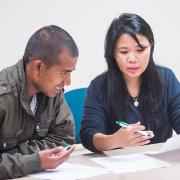 Nepali and Burmese-speaking patrons learn about financial literacy. Nepali and Burmese-speaking patrons learn about financial literacy.
