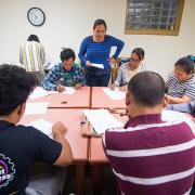 Nepali and Burmese-speaking patrons learn about financial literacy. Nepali and Burmese-speaking patrons learn about financial literacy.