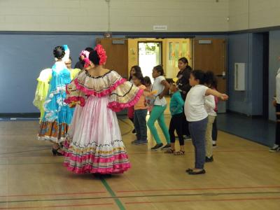 Kids learn Folklorico dance